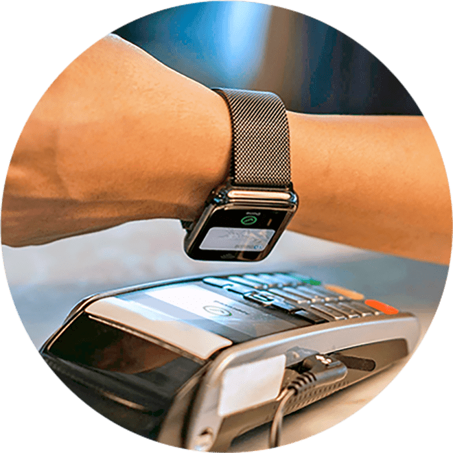 close up of watch at payment terminal