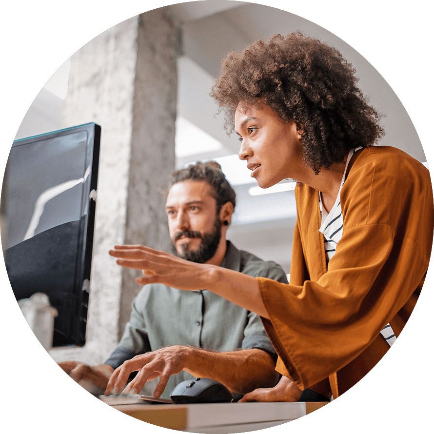 two people working on a solution together
